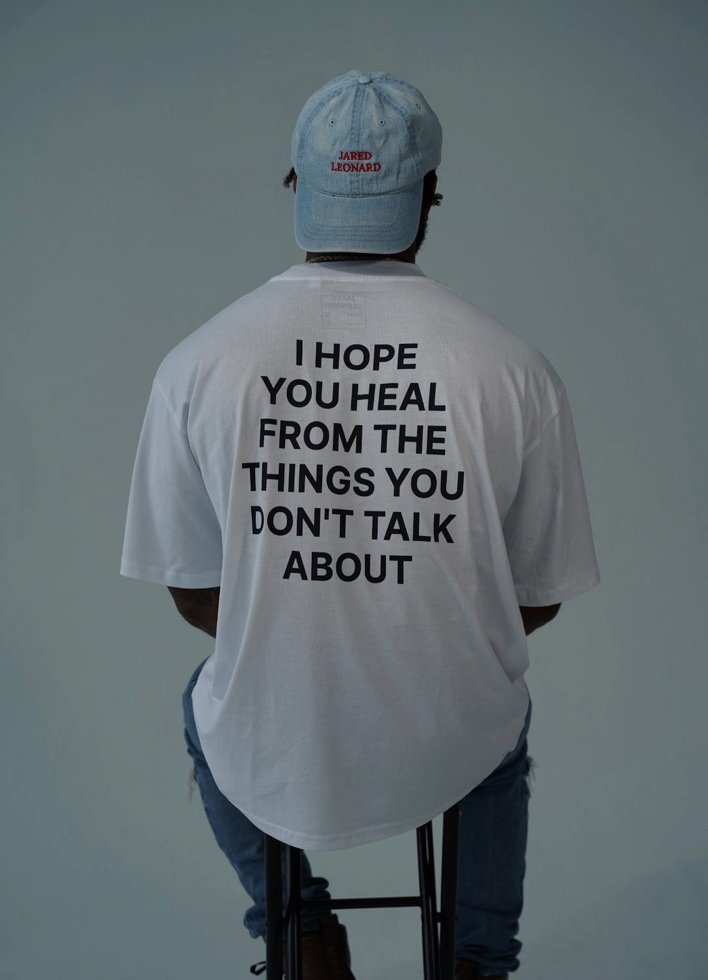 JARED LEONARD OVERSIZED T BLACK TEXT