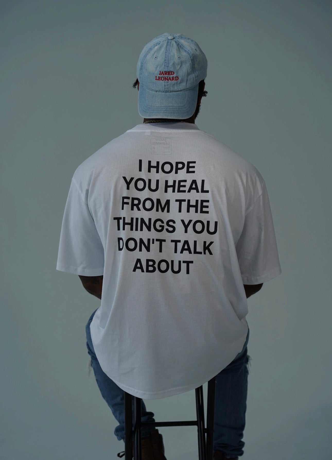 JARED LEONARD OVERSIZED T BLACK TEXT